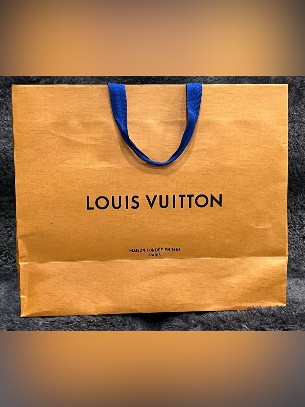 Authentic Louis Vuitton Orange Shopping Bag with Blue Ribbon Handles